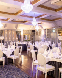 Elegant dining room set for a family gathering at The Anner Hotel.