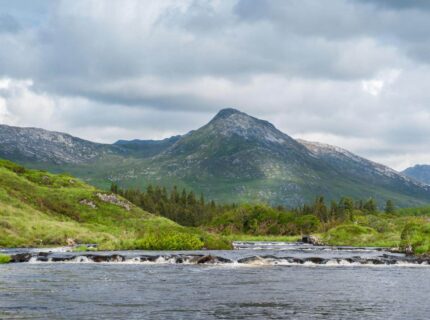 Family enjoying a scenic river and mountain view at The Anner Hotel, Conference & Leisure Center