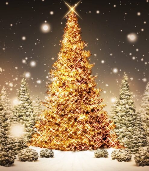 Family enjoys snow near a bright, festive Christmas tree in a winter wonderland.
