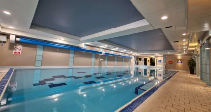 Indoor pool with calm water and a relaxing atmosphere at The Anner Hotel.
