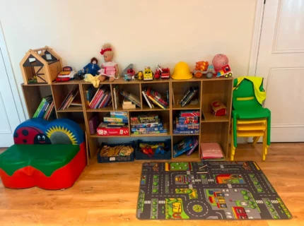 Cosy children's play area with toys and books at The Anner Hotel.